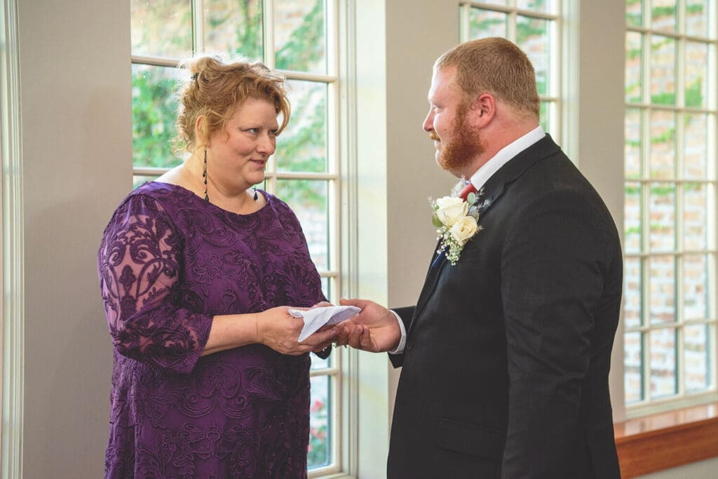 Mother and son have a moment during son's wedding day.