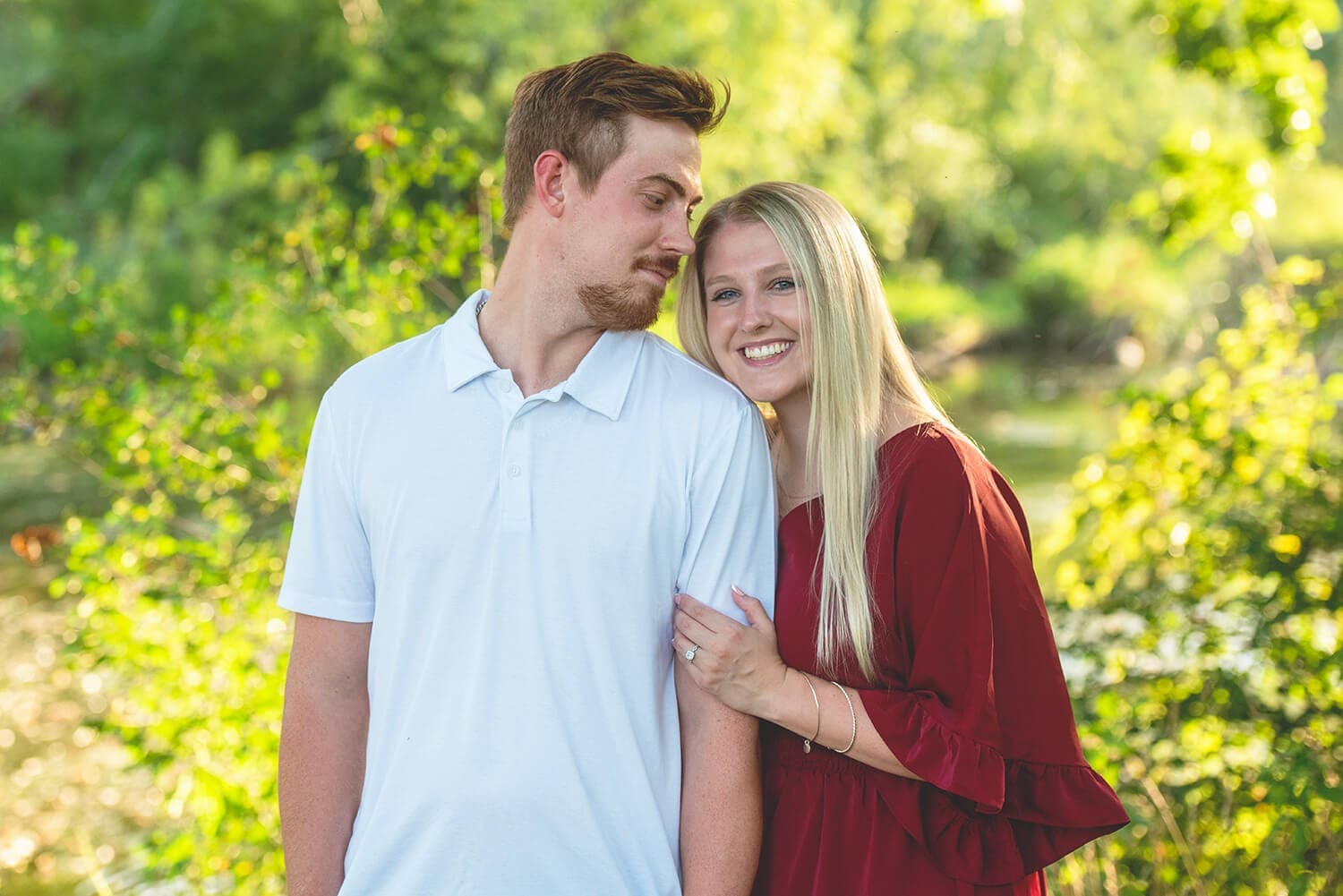 Engaged couple take photos in a park in Illinois