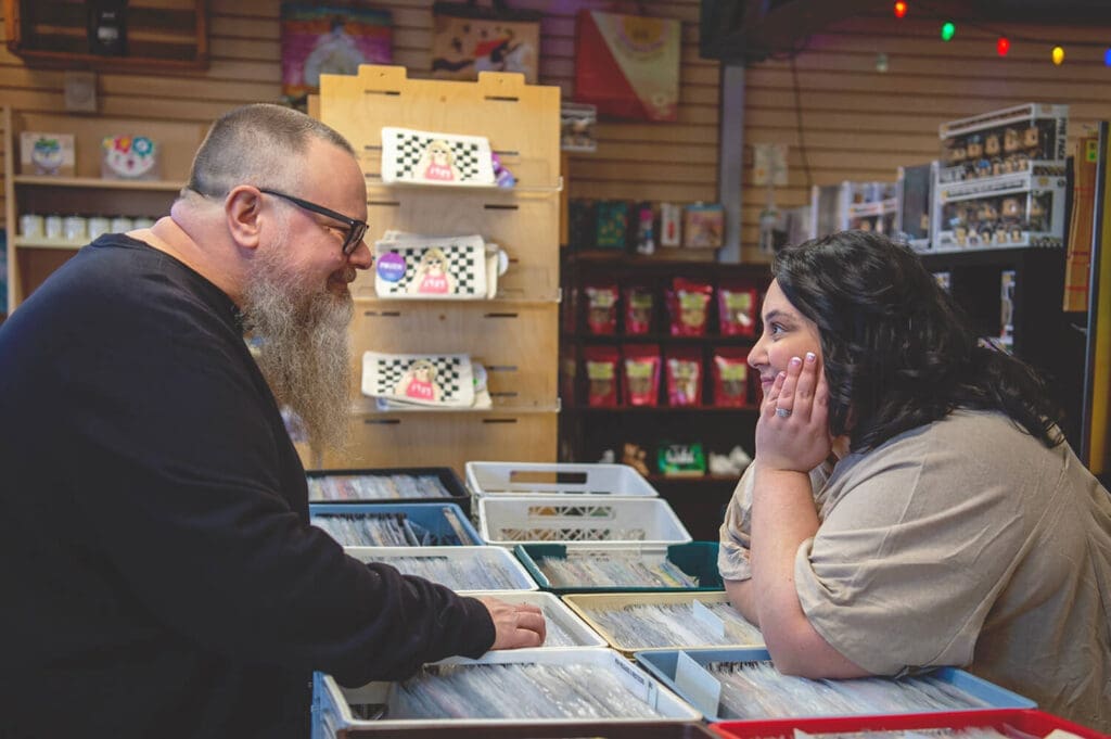 Engaged couple take photo at Culture Shock in Rockford, IL