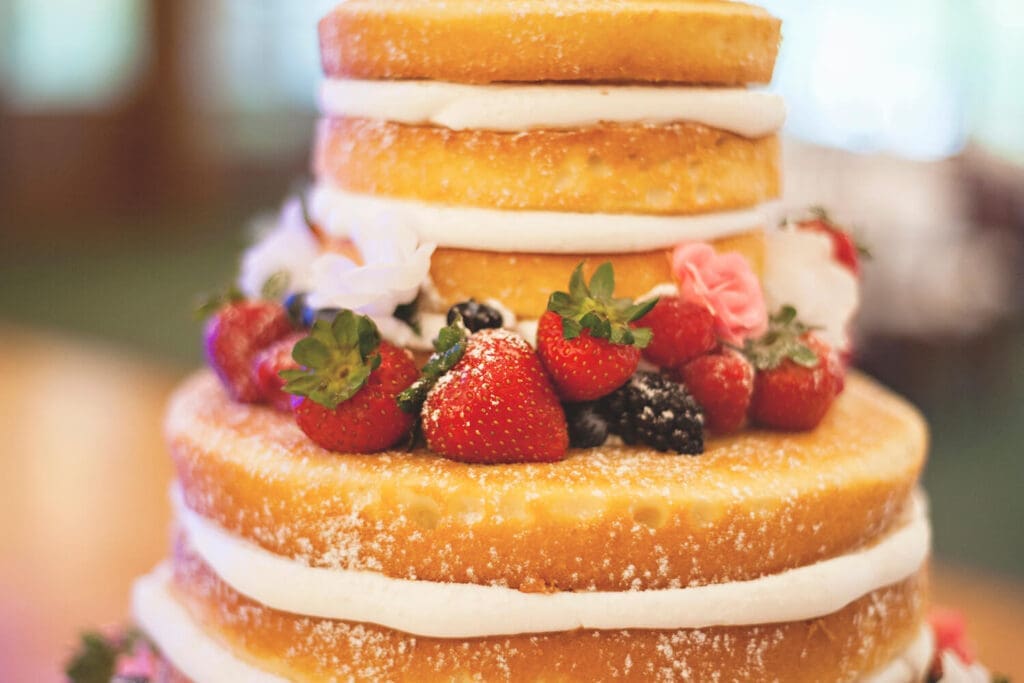 bare wedding cake with fruit