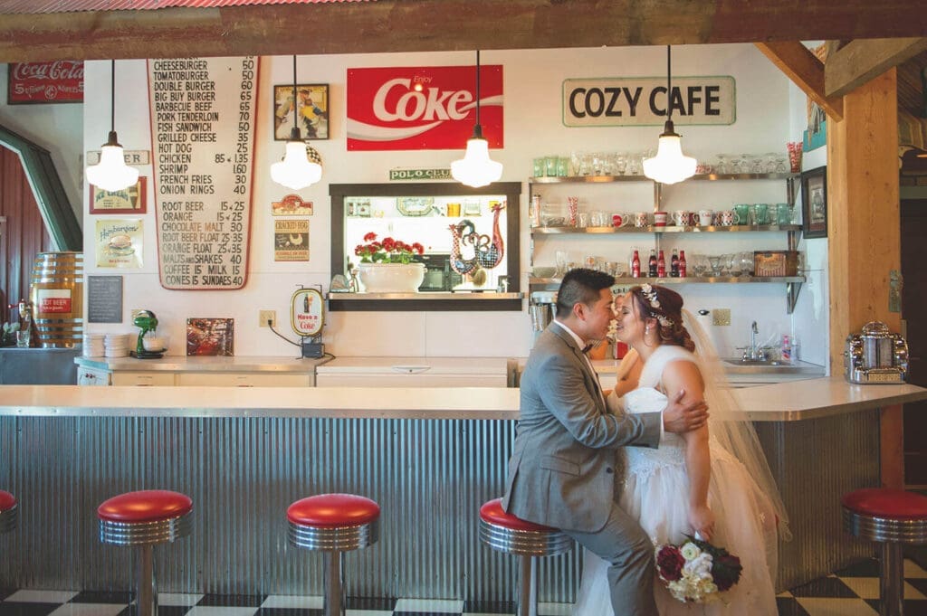 wedding couple embrace at Barnacopia in Polo, IL