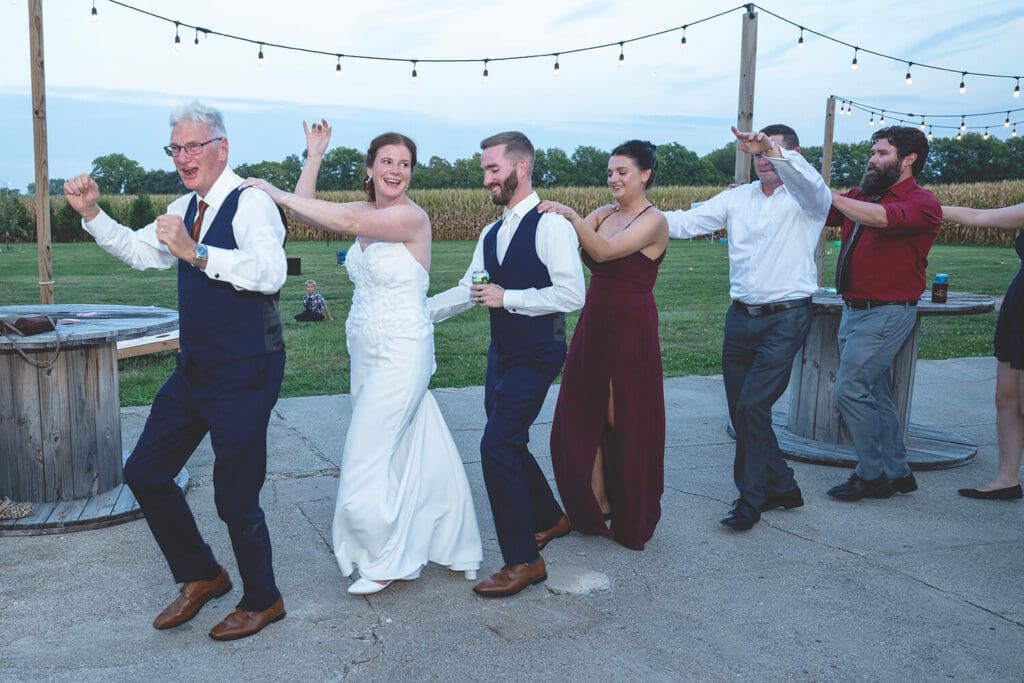 Wedding couple dances with guests in Southern Wisconsin