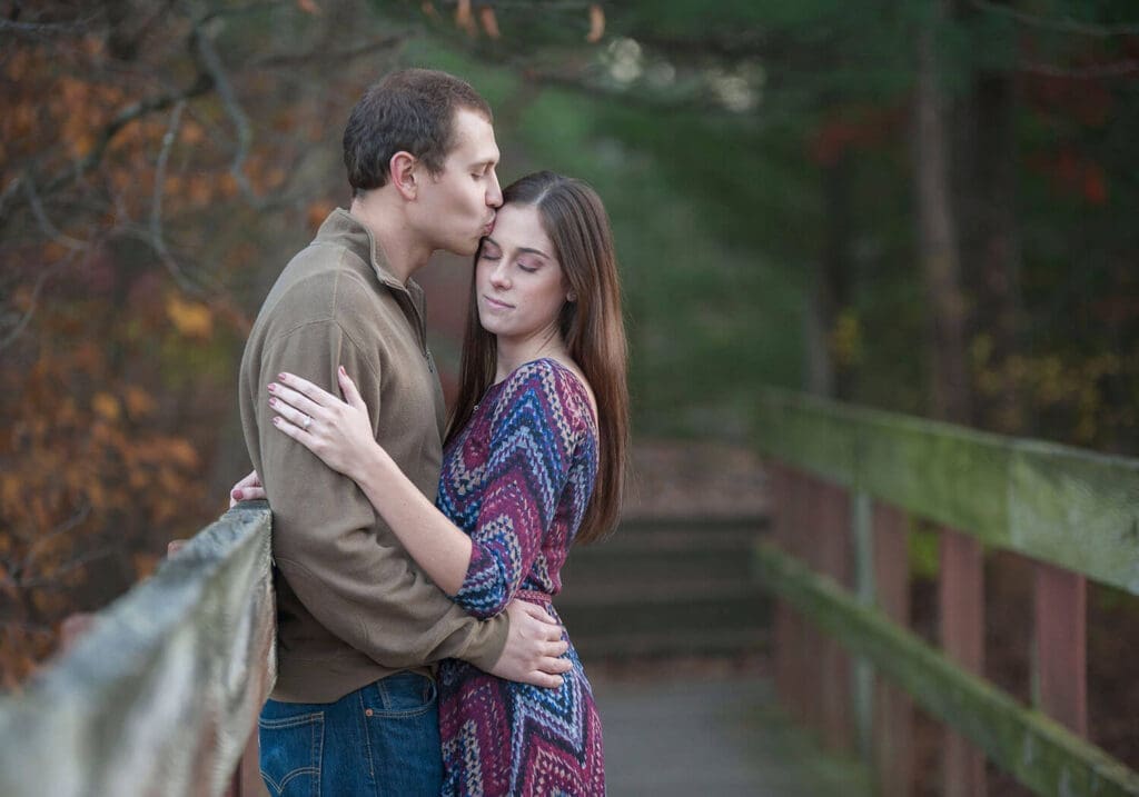 Engaged couple take engagement photos in a park in Northern Illinois