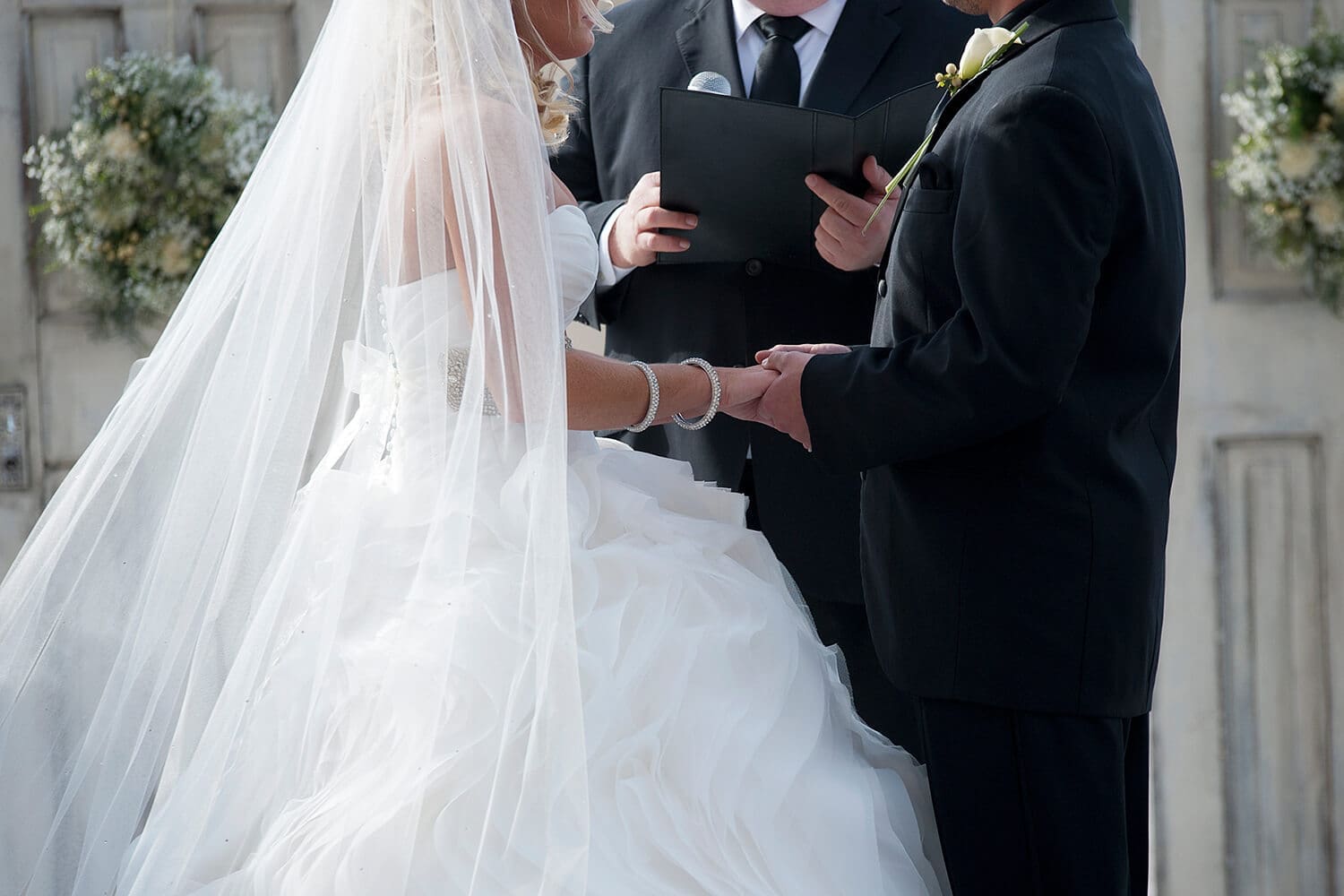 wedding couple have outdoor ceremony at Prairie St. Brewing Co. in Rockford, IL