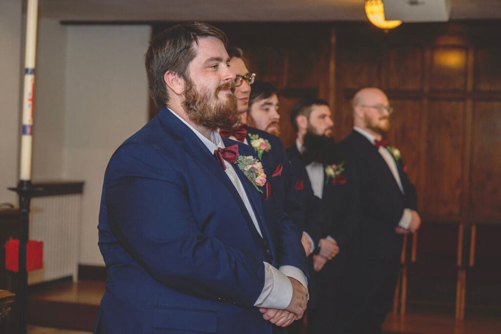 grooms reaction to bride coming down the aisle