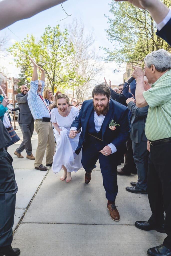 bride and groom exit wedding
