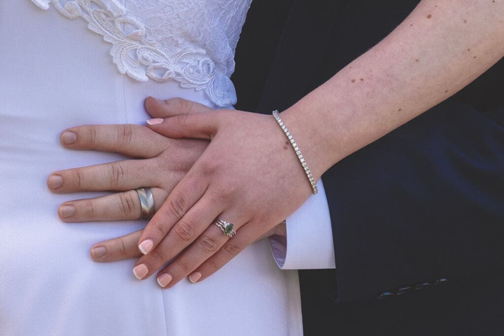 bride and groom show rings