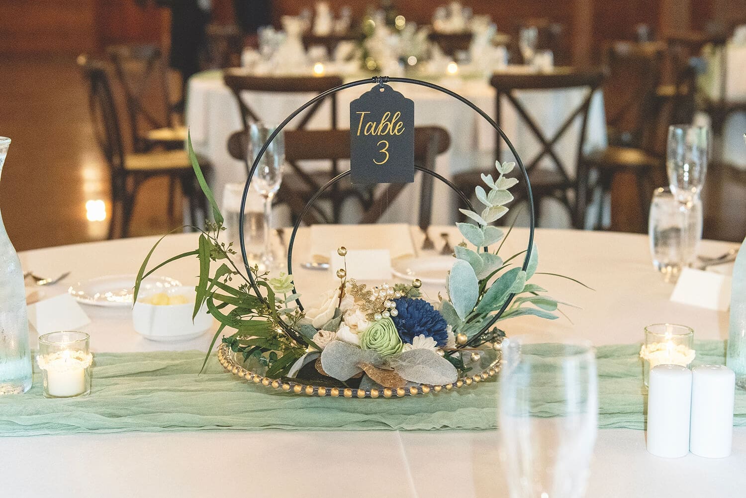 Wedding table decorations at a reception at The Pavilion at Orchard Ridge in Rockford, IL