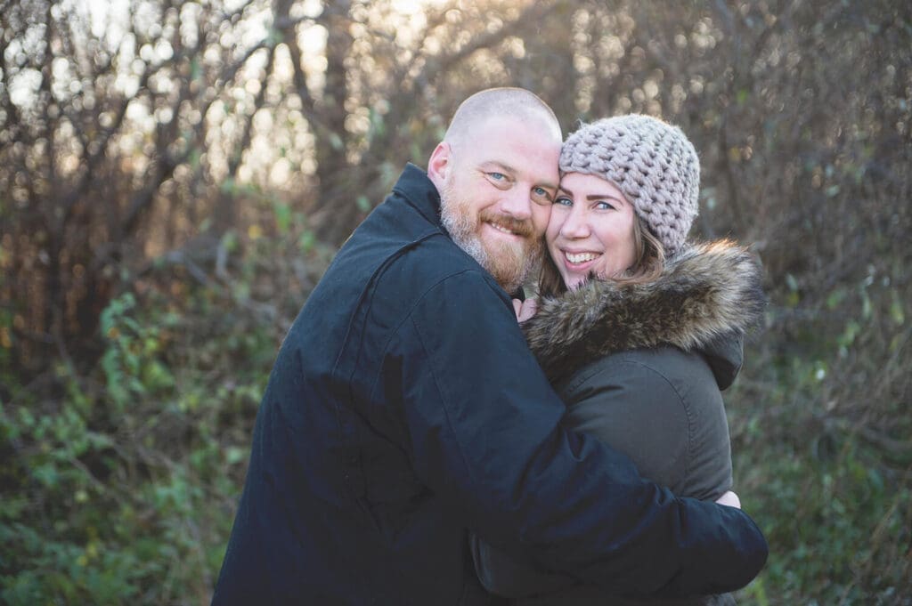 Engaged couple embrace in Rockford, IL