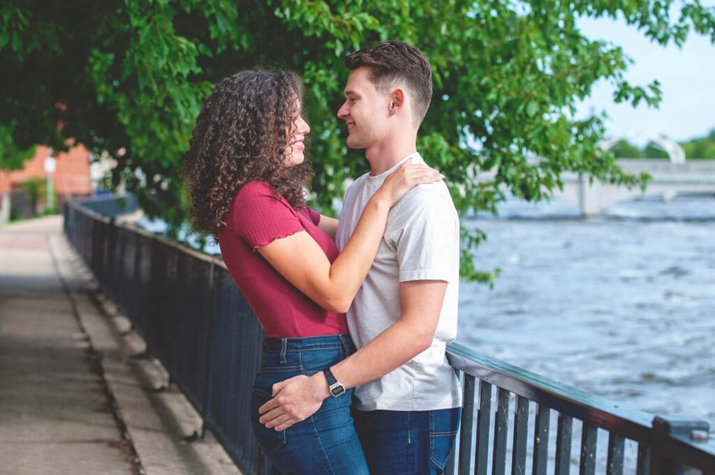 Engaged couple take engagement photos in Janesville, WI