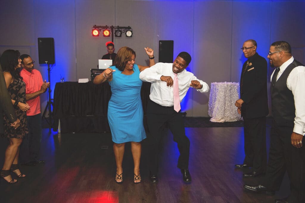 Couple dance to a DJ at a wedding reception in Rockford, IL