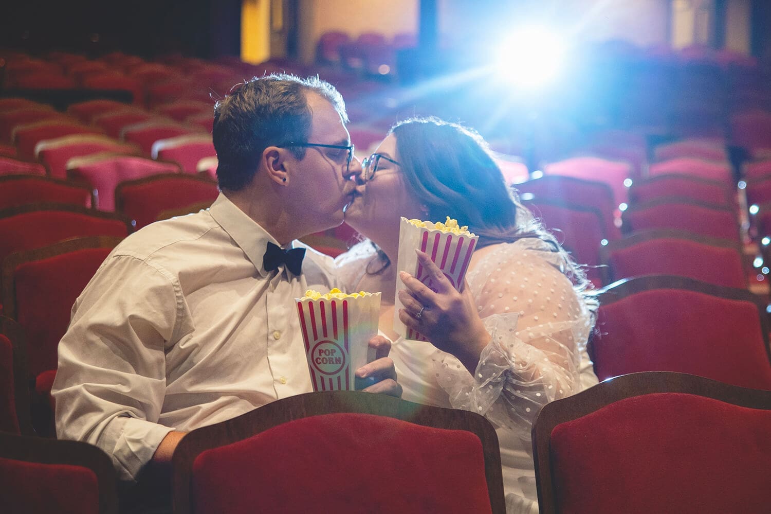 Engaged couple have engagement photos shot at Egyptian Theater in DeKalb, IL