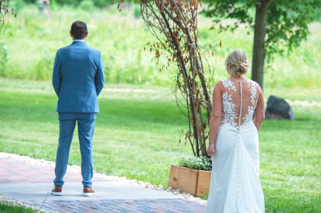 Wedding couple does a first look at Hidden Creek Estates in Roscoe, IL