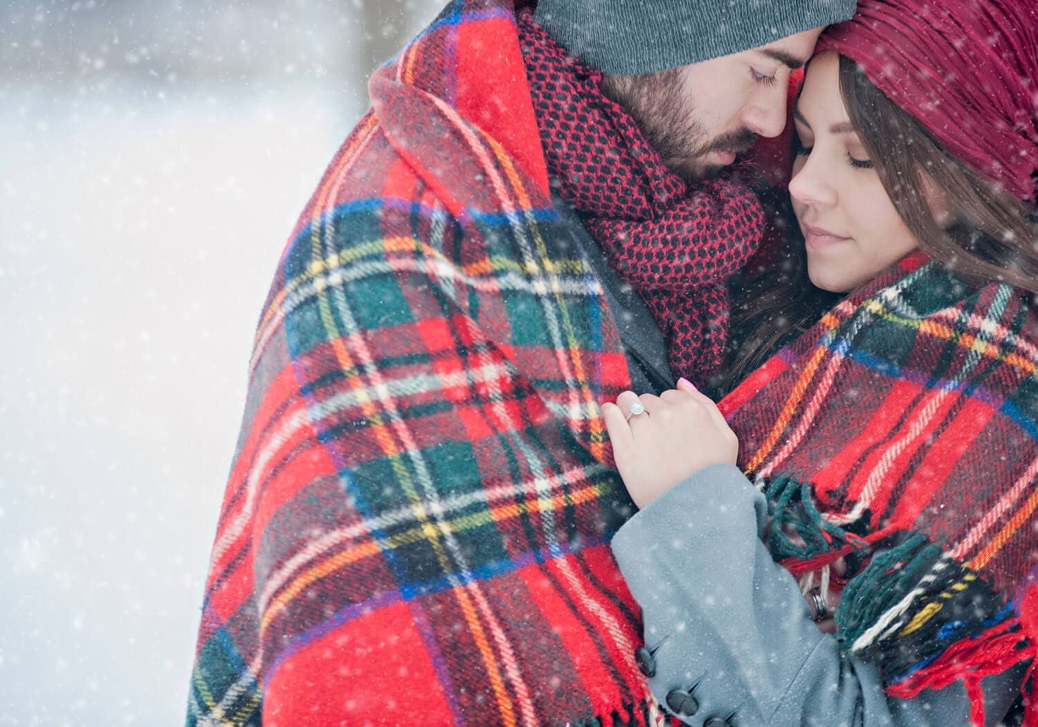 Shelby and Matt have engagement photos done in the snow