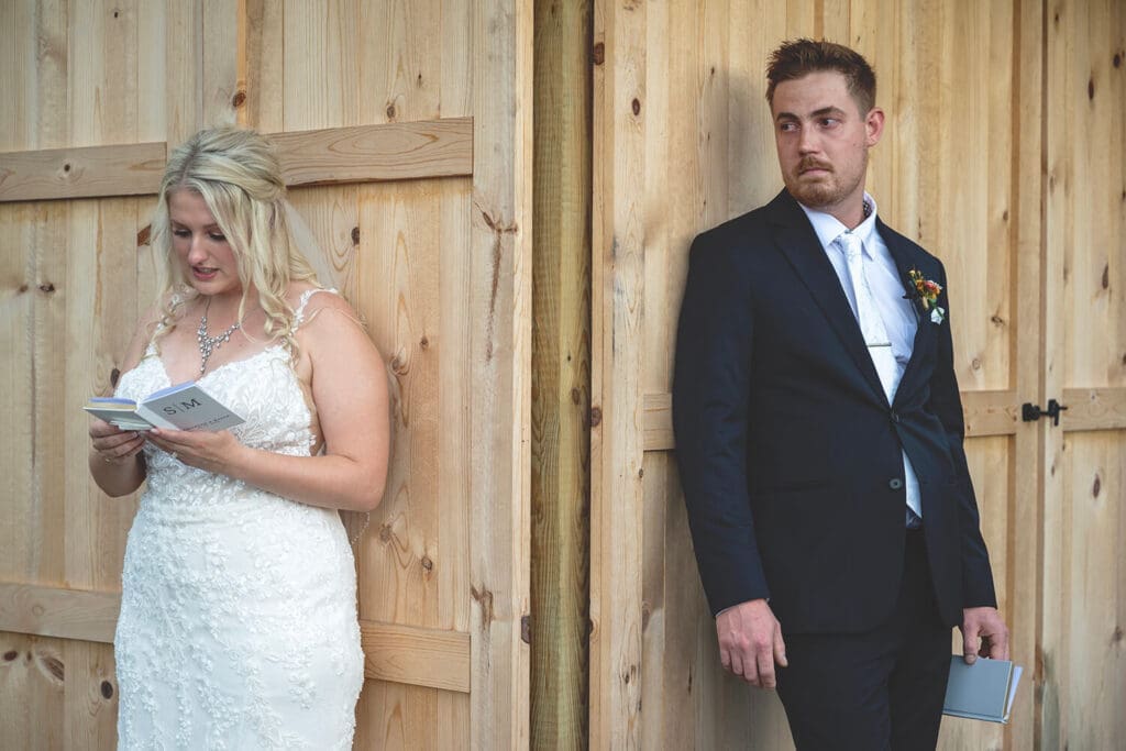 Wedding couple read private vows without seeing one another